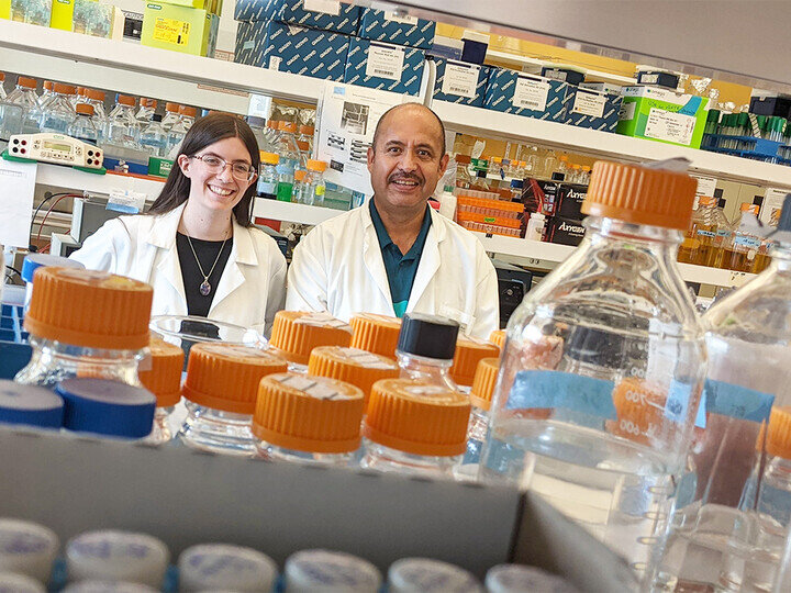 An image of two researchers working in a lab